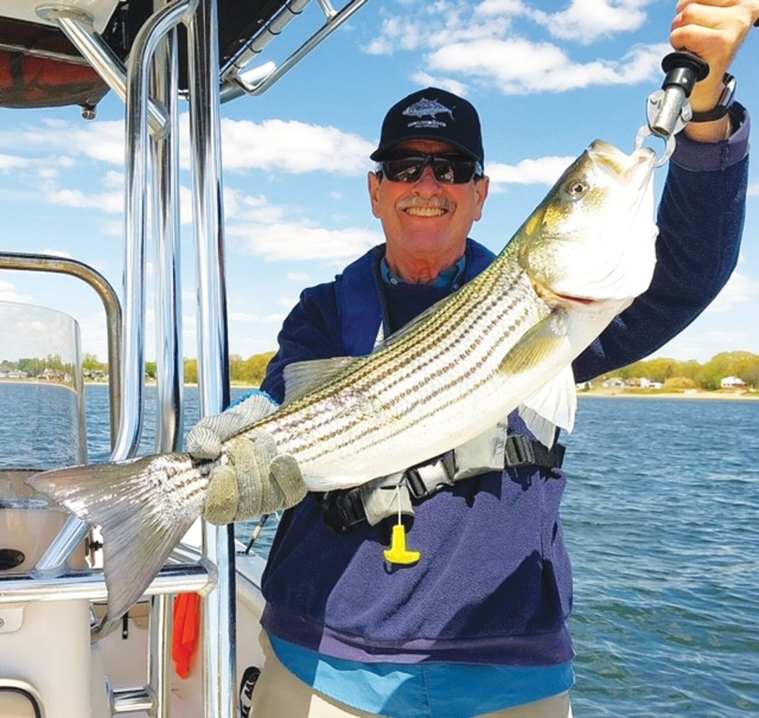 TUBE IN WORM: Capt. Dave Monti and his fishing party caught spring striped bass to 30 inches. Saturday in Greenwich Bay in front of Buttonwoods using tube in worm. Monday the gator bluefish were there too.